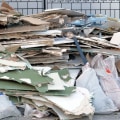 What types of materials cannot be recycled through debris removal and hauling?